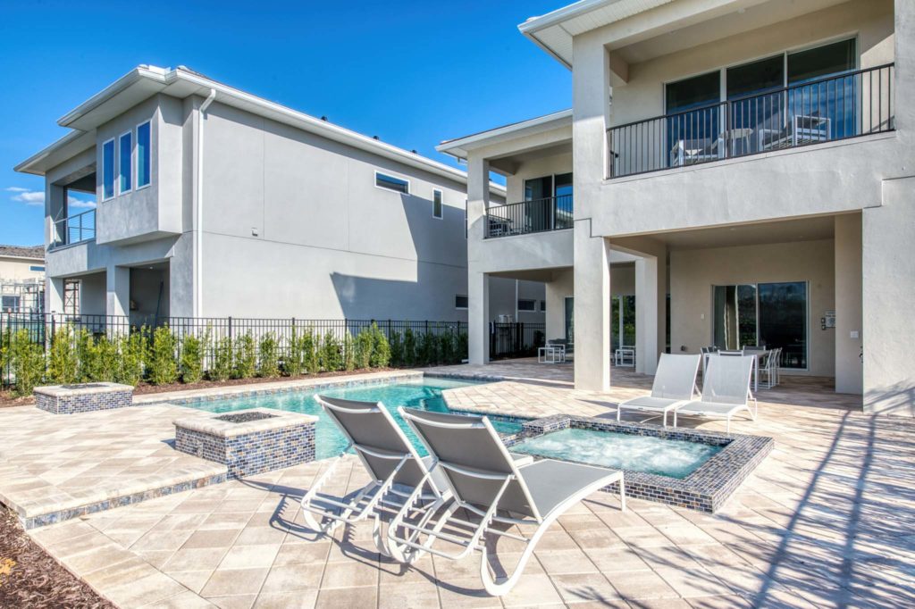 Private pool and heated spa at an an elegant 8-bedroom Bear’s Den Resort Orlando residence.
