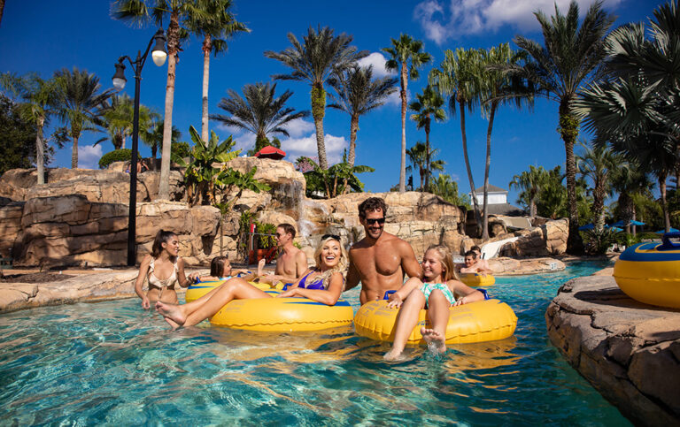 Family in tubes floating in a lazy river