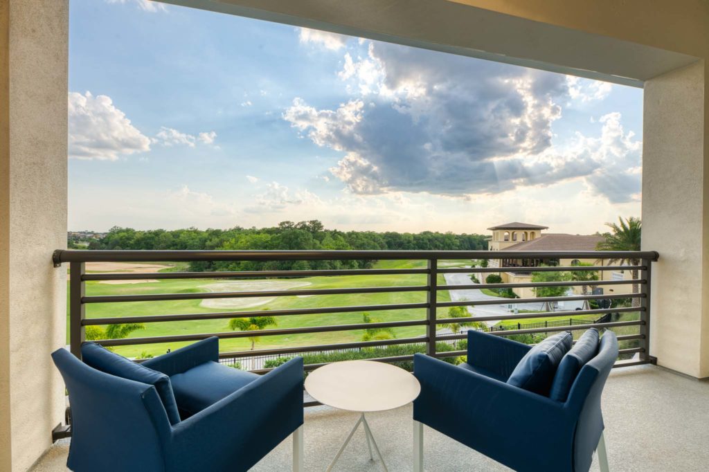 Covered outdoor balcony overlooking the 18th hole of the Jack Nicklaus signature golf course.