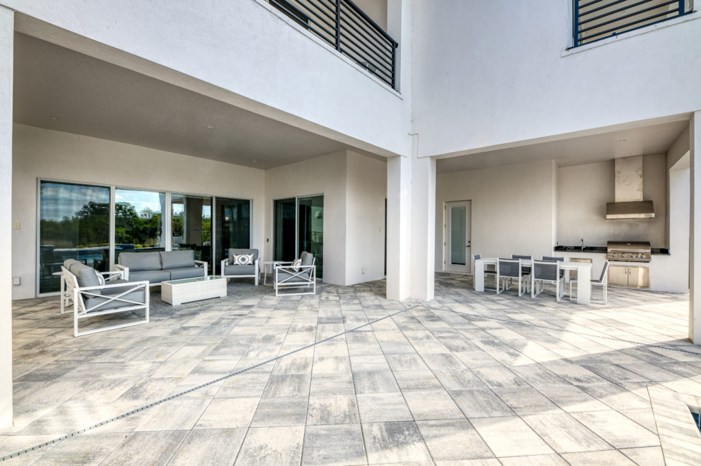 Bear's Den Outdoor Kitchen And Dining At A Vacation Home Rental In Orlando Florida.