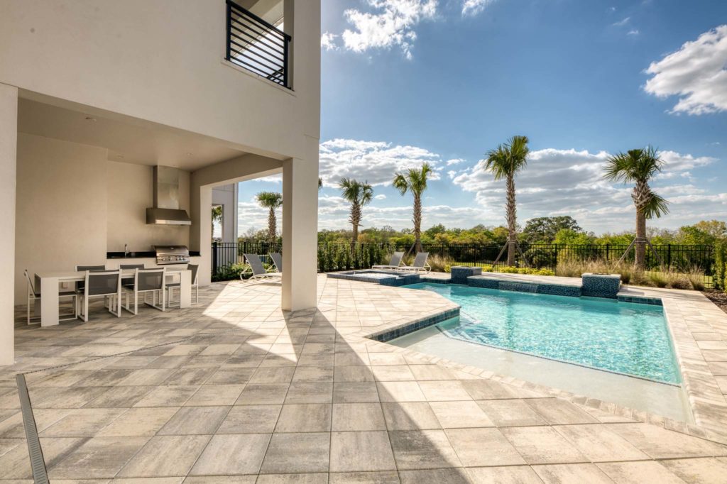 Private backyard pool and summer kitchen.