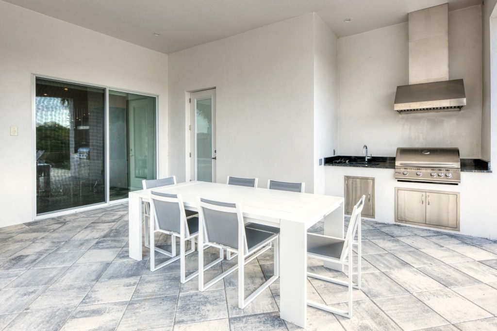 Covered outdoor lanai and summer kitchen.