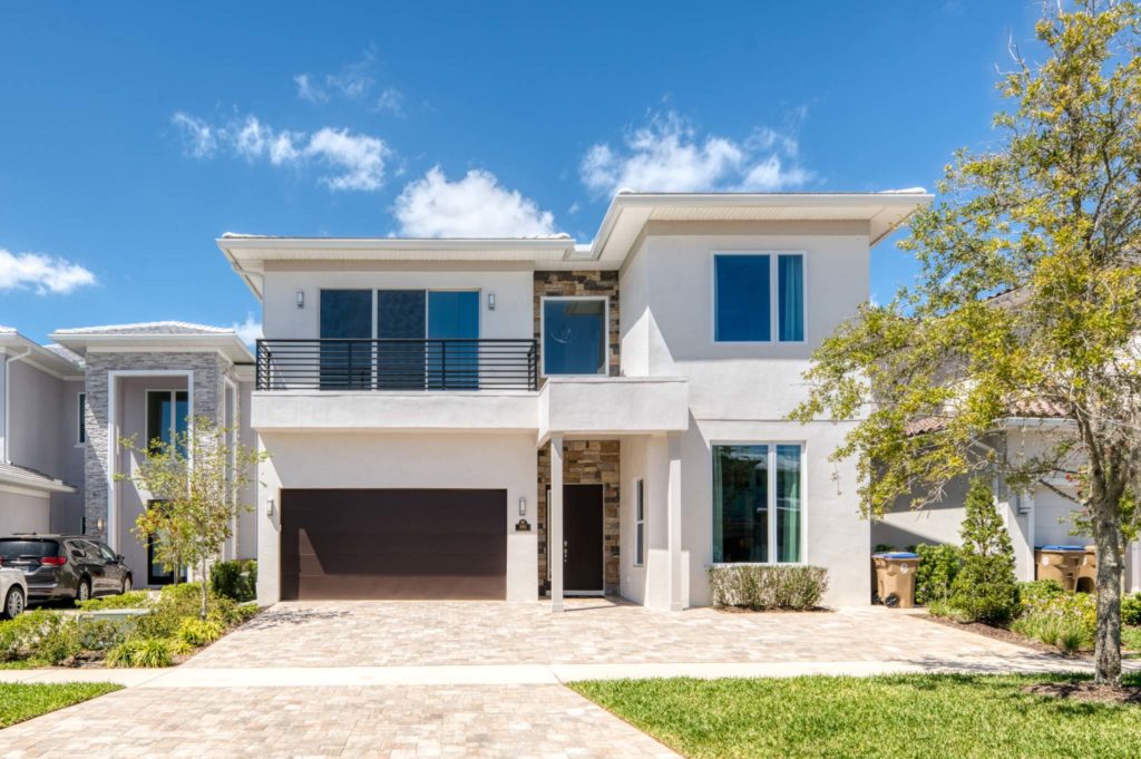 Front of a superb 8-bedroom, two-floor resort residence.