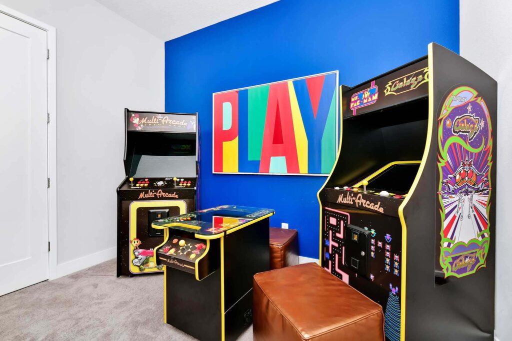 Retro arcade machines in the game room of a superb 8-bedroom Bear’s Den Resort Orlando residence