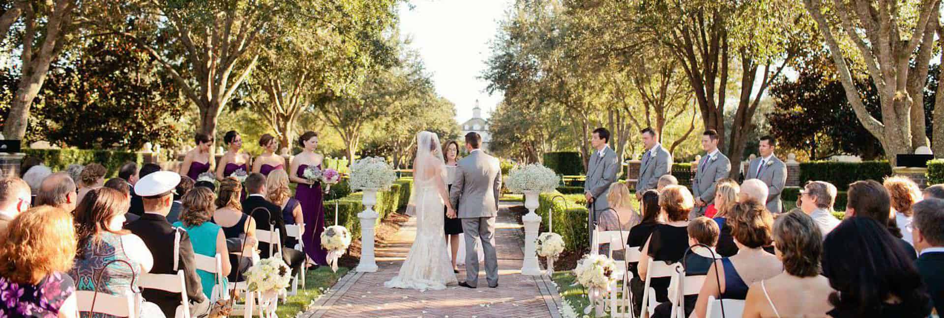 Crowd gathered at an outdoor wedding at The Bear’s Den Resort Orlando.