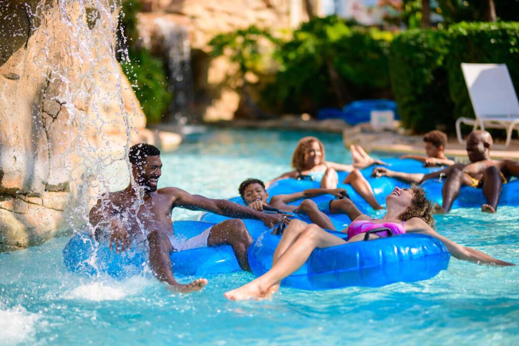 Reunion Resort Water Park 2 Families enjoying the lazy river at the Reunion Resort Water Park