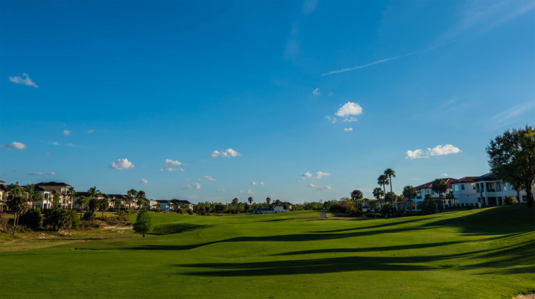 Wide view of one of the golf courses at The Bear’s Den Resort Orlando.