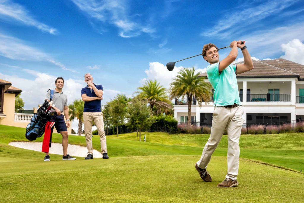Group of three men golfing at The Bear’s Den Resort Orlando.