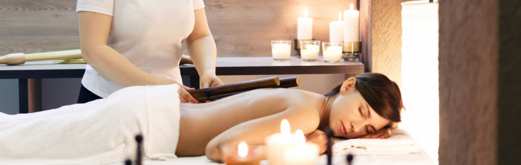 Woman receiving an in-home spa treatment.
