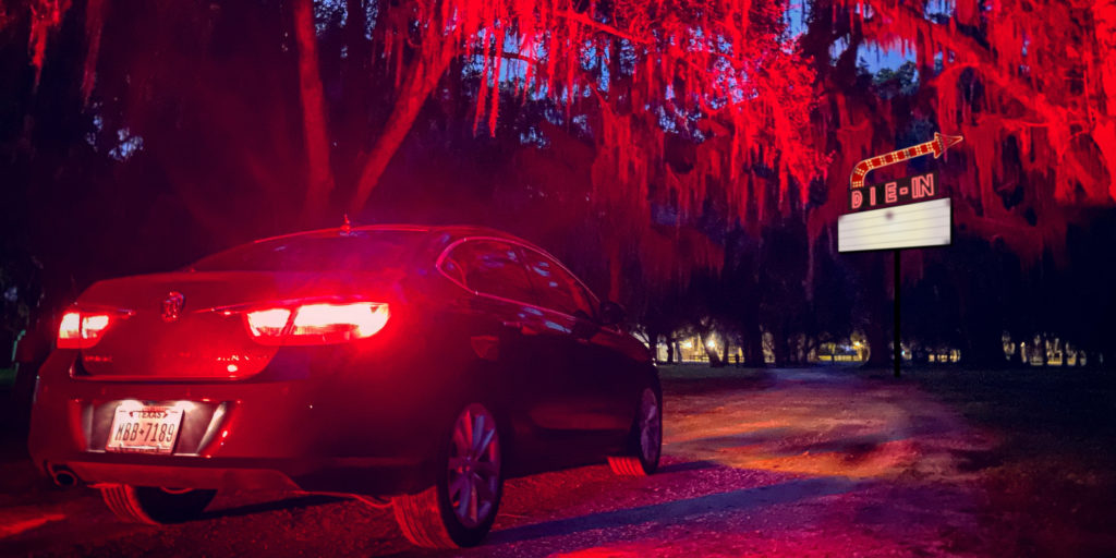 Car Pulls Up To A Spooky Halloween Drive-in At Bear's Den Resort Orlando.