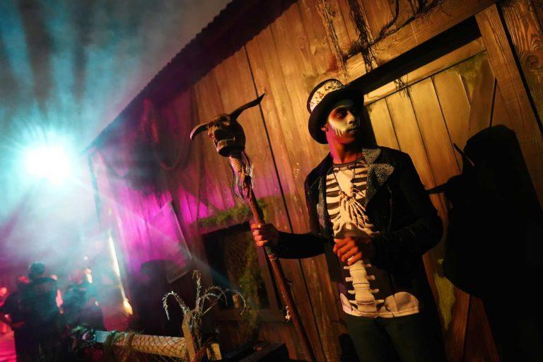 Man dressed up as a witch doctor for Halloween