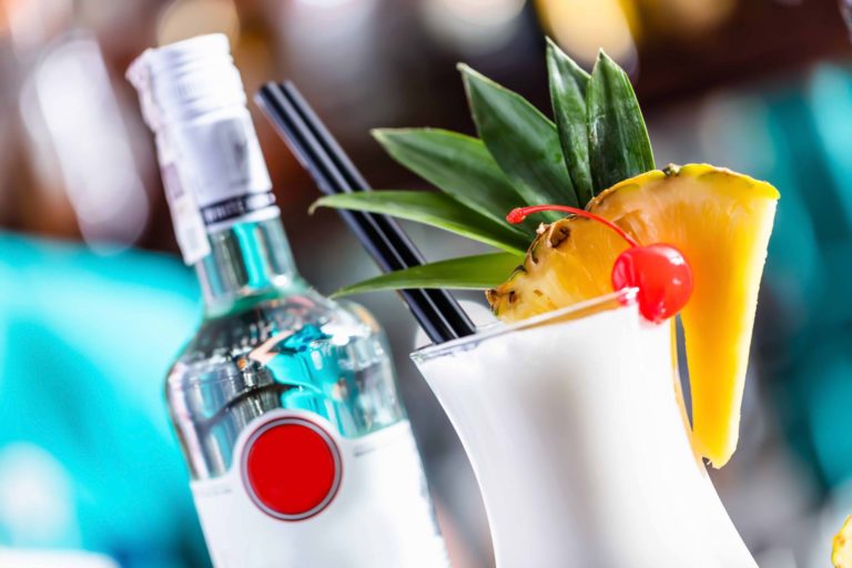 Pina colada coctail on bar counter.