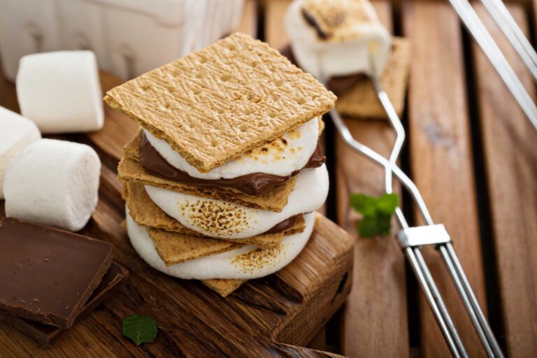 Stack of s'mores on a picnic table