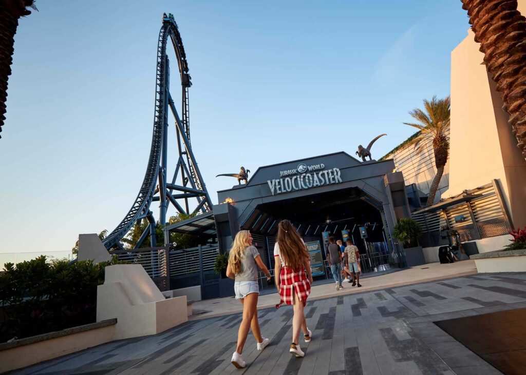 Friends walking up to the queue line for the Velocicoaster in Universal Studios Islands of Adventure