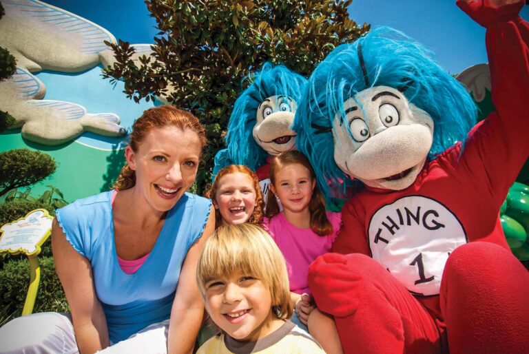 Family taking a selfie with Thing 1 and Thing 2 at Seuss Landing at Universal Islands of Adventure